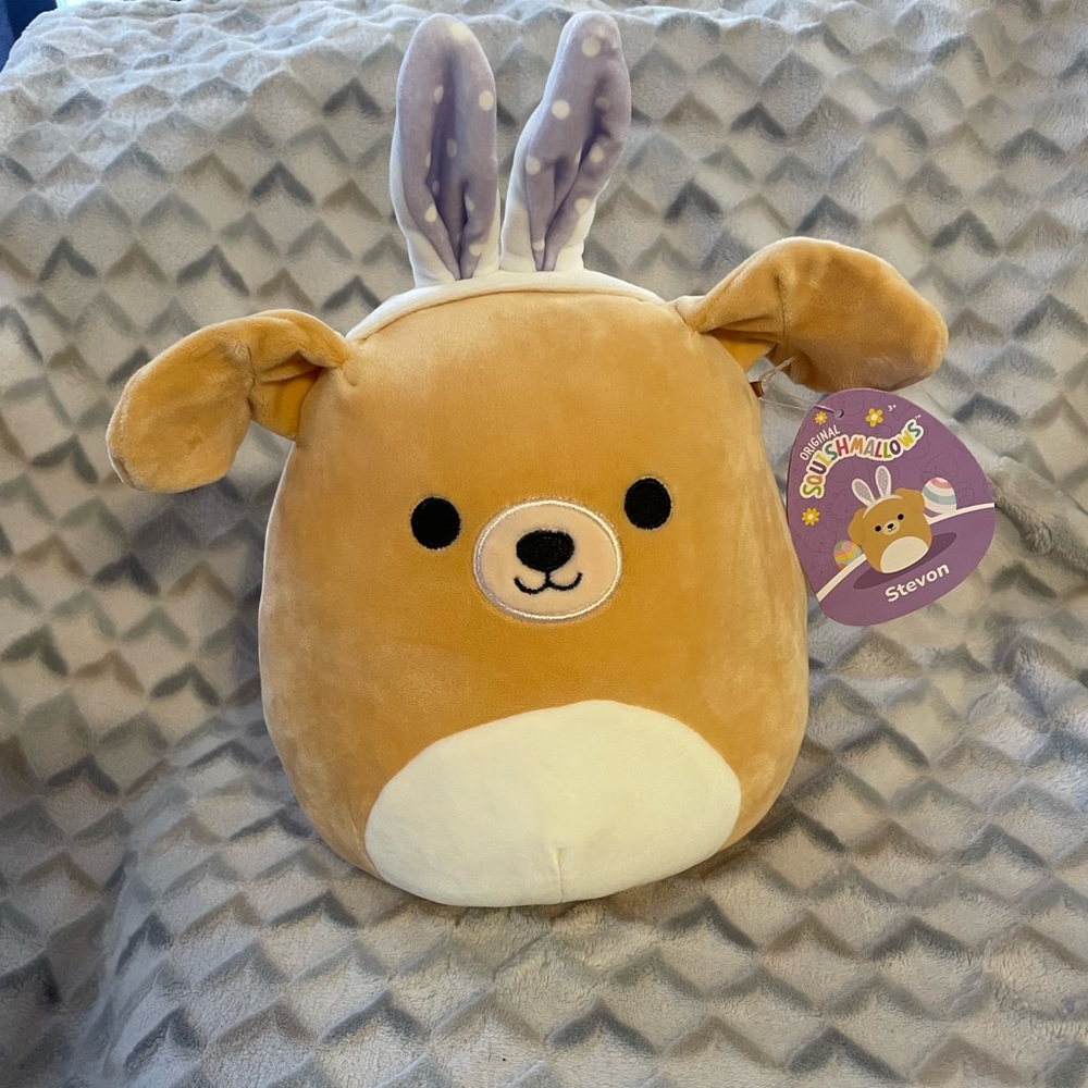 Squishmallows plush toy Stevon the Golden Retriever Easter bunny ears celebrate
